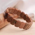 Goldstone Oval Faceted Bracelet ( Man-Made )