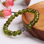 Peridot Buddha Bracelet ( Synthetic )