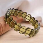 Peridot Oval Faceted Bracelet ( Synthetic )